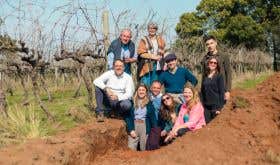 The author in pink shirt with the crew from Estancia Paraizo in Campanha in a soil pit in the vineyard