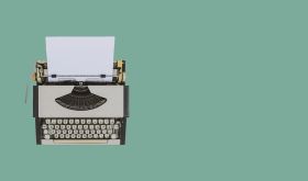 typewriter on sea green Background