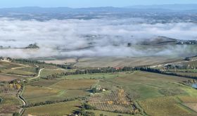 Morning fog over Montalcino by Walter Speller