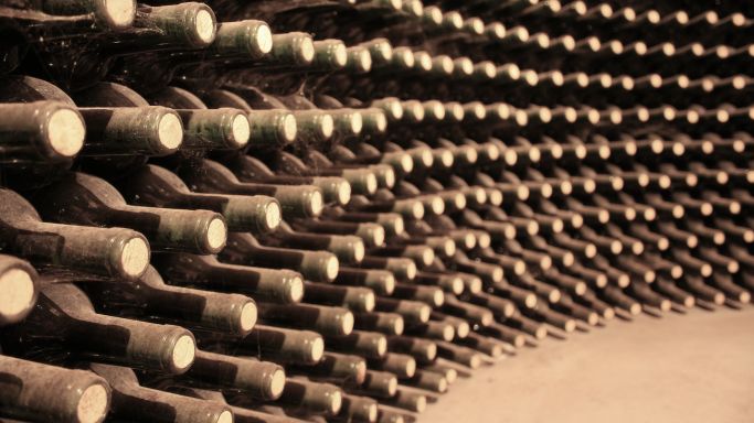 cellar of old bottles of Rioja from GettyImages-ManuelVelasco