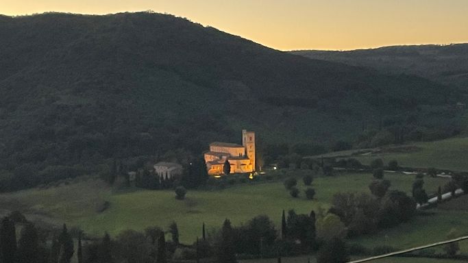 Abbey of Sant'Antimo in Castelnuovo dall'Abate at dusk by Walter Speller