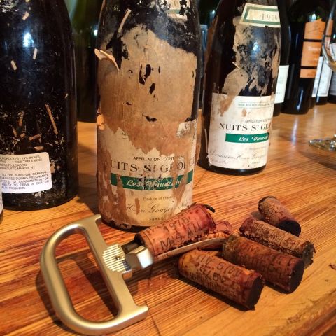 Durand corkscrew opening an old bottle of wine