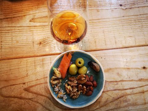 Henriques e Henriques 10 Year Old Sercial with nuts, olives, pickled cockles and smoked salmon