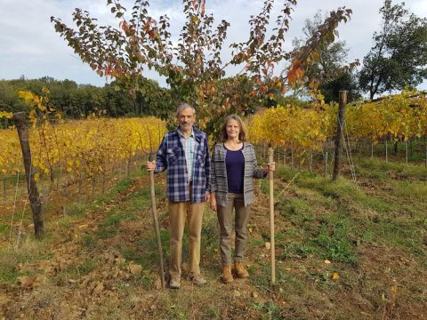 Katia Nussbaum and husband Gigi, reminiscent of the famous American primitive painting of a farming couple