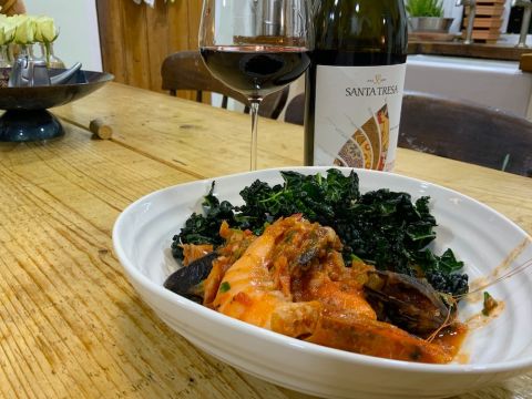 Santa Tresa's Cerasuolo di Vittoria with fish stew and cavolo nero