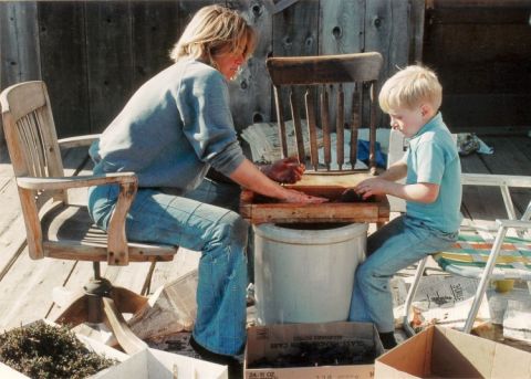 Pat and Adam Hand Crushing Grapes
