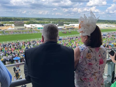 Nick Bevan and Barbara Banke watch a race at Ascot in 2023