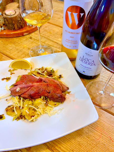 Venison with cabbage and both wines