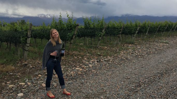 Carrie Dann in a vineyard
