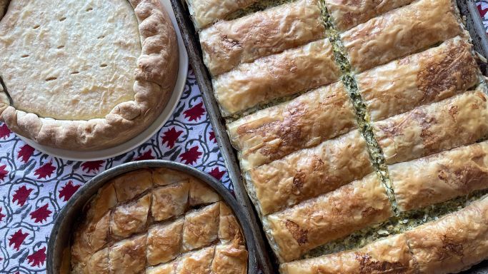 Clockwise from right: chicken pie, spinach pie/spanakopita and mushroom pie